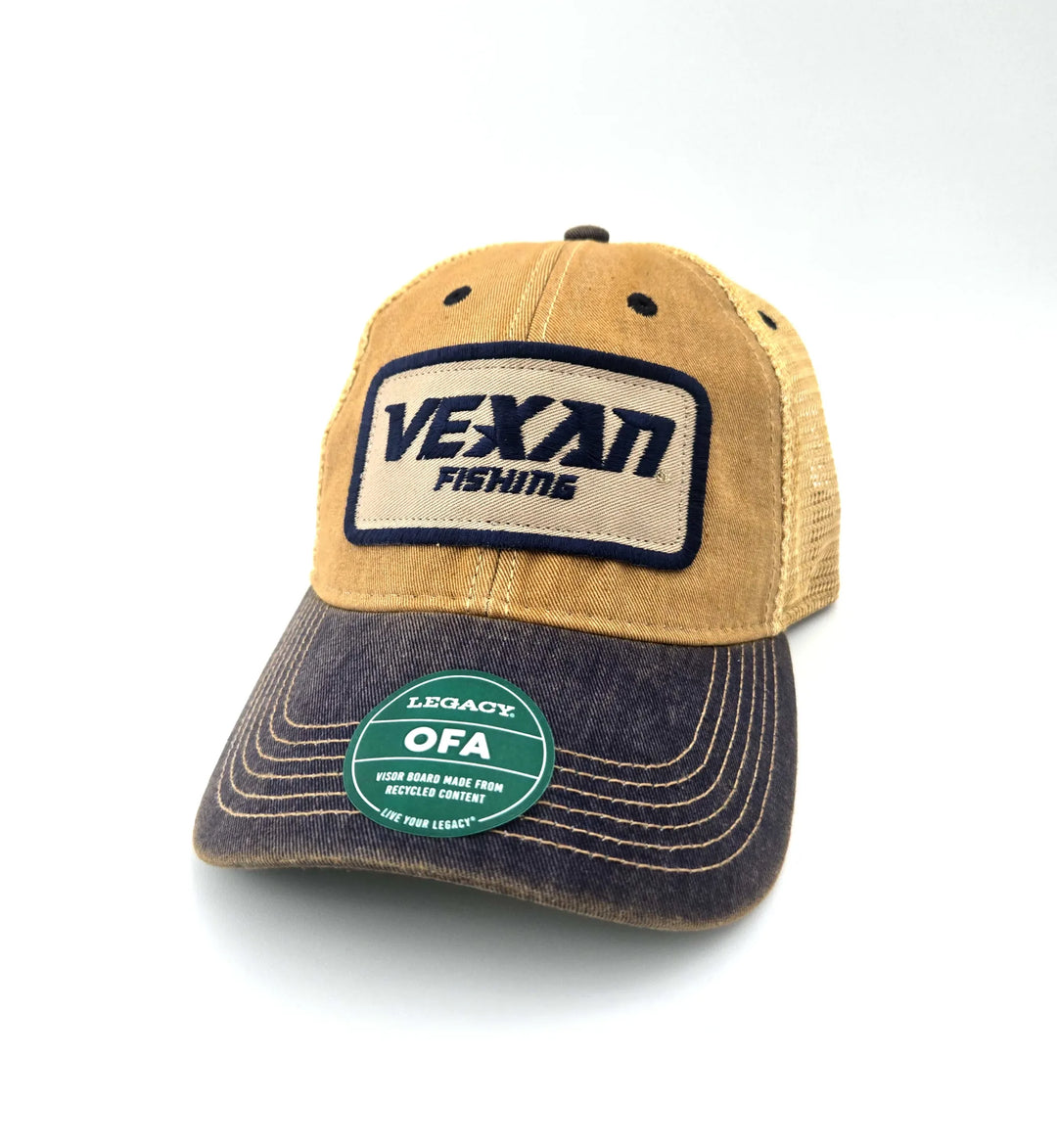Two-tone tan and navy fishing cap with Vexan Fishing logo on a white background